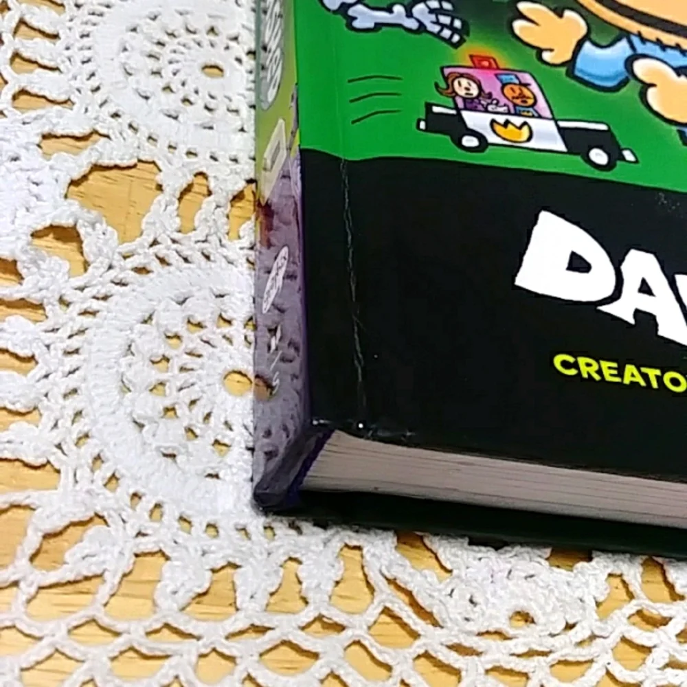 Unleashed Dog Man by Dav Pilkey, Scholastic, color-illustrated comic
